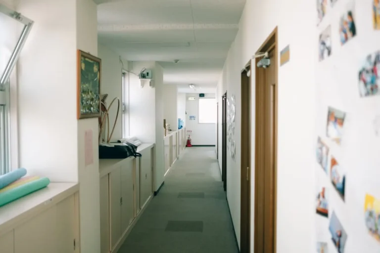 Office corridor with doors along one side